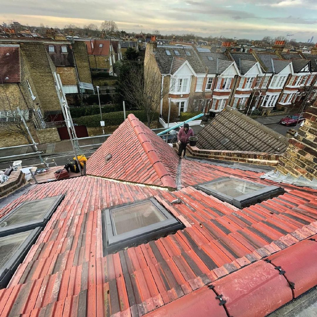 roofers working on pitched roof
